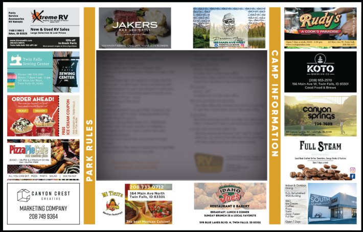 Inside of a guide: park rules and camp information in the center, fourteen local business ads around the edge
